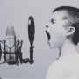 Amy Jean Blog - Say Something Poem - Boy Shouting into microphone