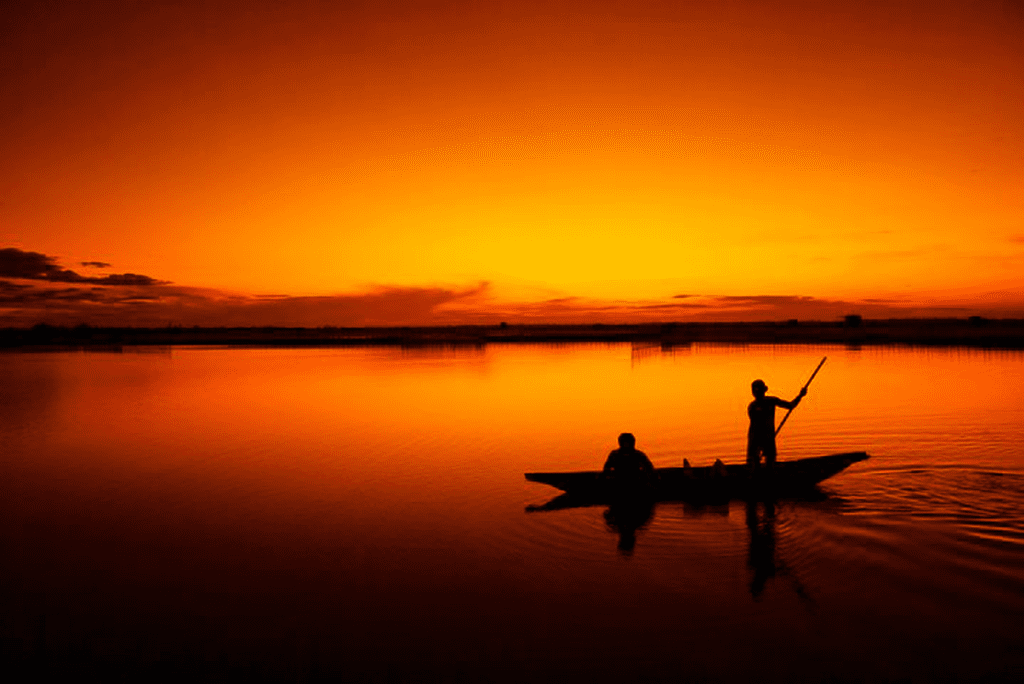 Amy Jean Blog -Let Down the Net - Fishermen on the water at sunset