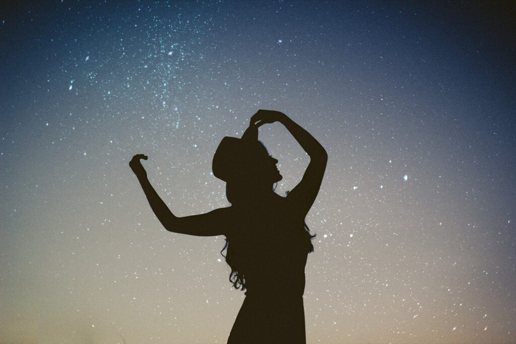 girl dancing in the night stars
crazy? no, beautiful