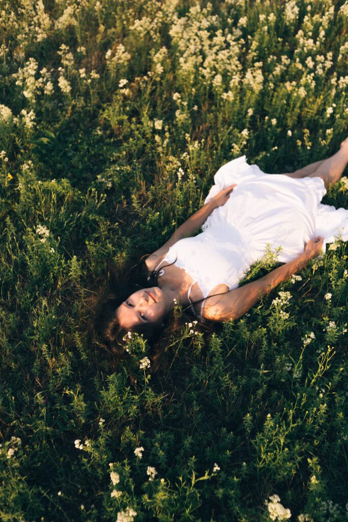 Girl laying in a field.
Crazy? No, Beautiful